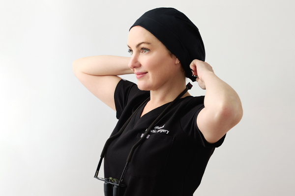 Dr. Safa Sharabi putting on cap